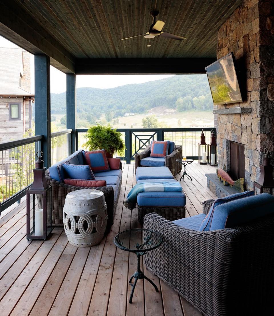 a living room with a view of the mountains