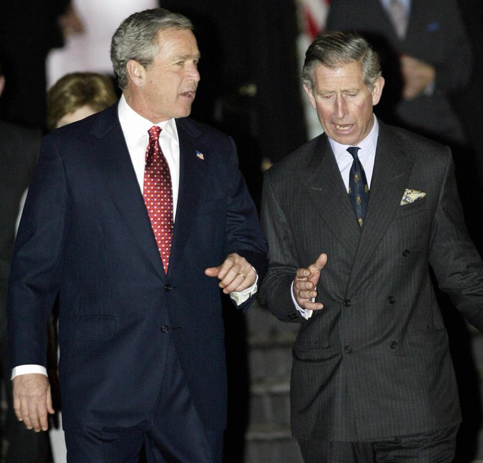 us president george w bush l walks wi