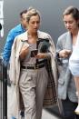 <p>Hermès belt and Burberry trench coat? This lady is living the dream. [Photo: Yahoo Style UK/Sabrina Carder] </p>