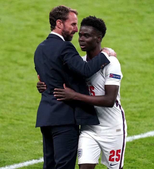 Bukayo Saka (right)