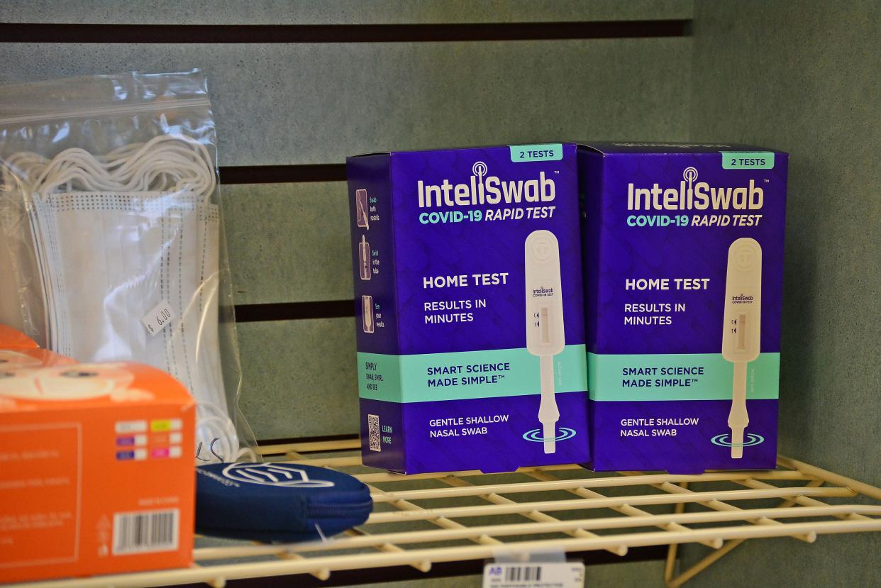 A couple of at-home COVID-19 tests sit on a shelf Thursday at the Paris Road location of D&H Drugstore in Columbia. A pharmacy employee said the kits sell out quickly.