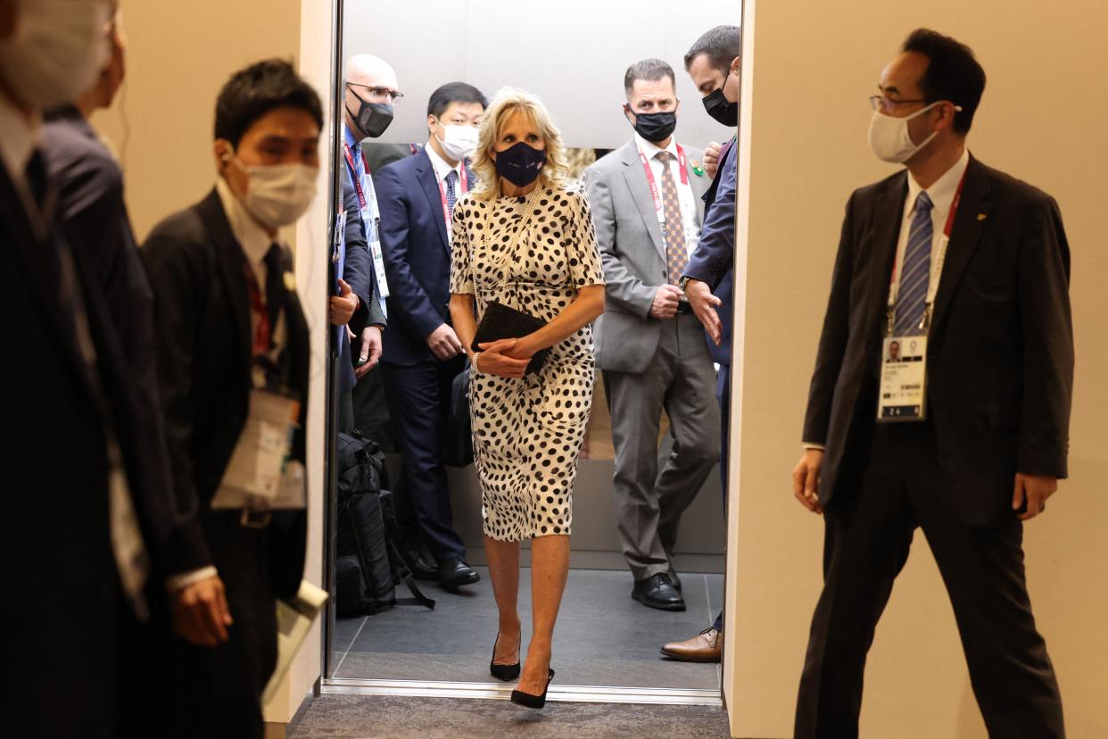 Jill Biden wore a white and black Brandon Maxwell polka dot dress to the opening ceremony (POOL/AFP via Getty Images)