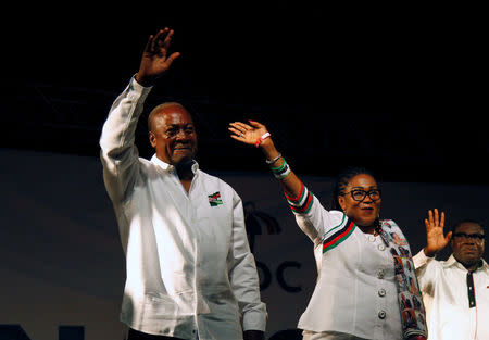 John Dramani Mahama, Ghana's president and National Democratic Congress (NDC) presidential candidate waves with his wife Lordina Mahama during his rally at Accra sport stadium, in Accra, Ghana December 5, 2016. REUTERS/Luc Gnago