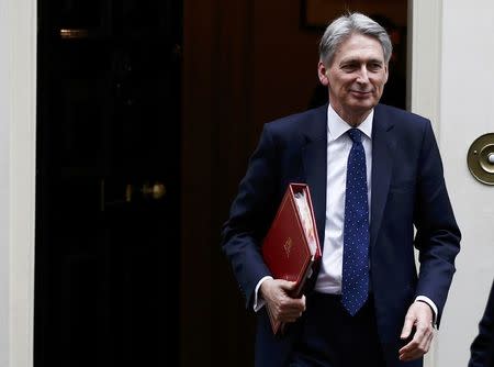 Britain's Chancellor of the Exchequer Philip Hammond leaves 11 Downing Street, London, January 31, 2017. REUTERS/Peter Nicholls