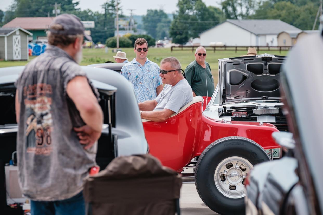 Strasburg Lions Club car show participant draws attention driving through the parking lot, Saturday, July 23 at Provia, in Strasburg.