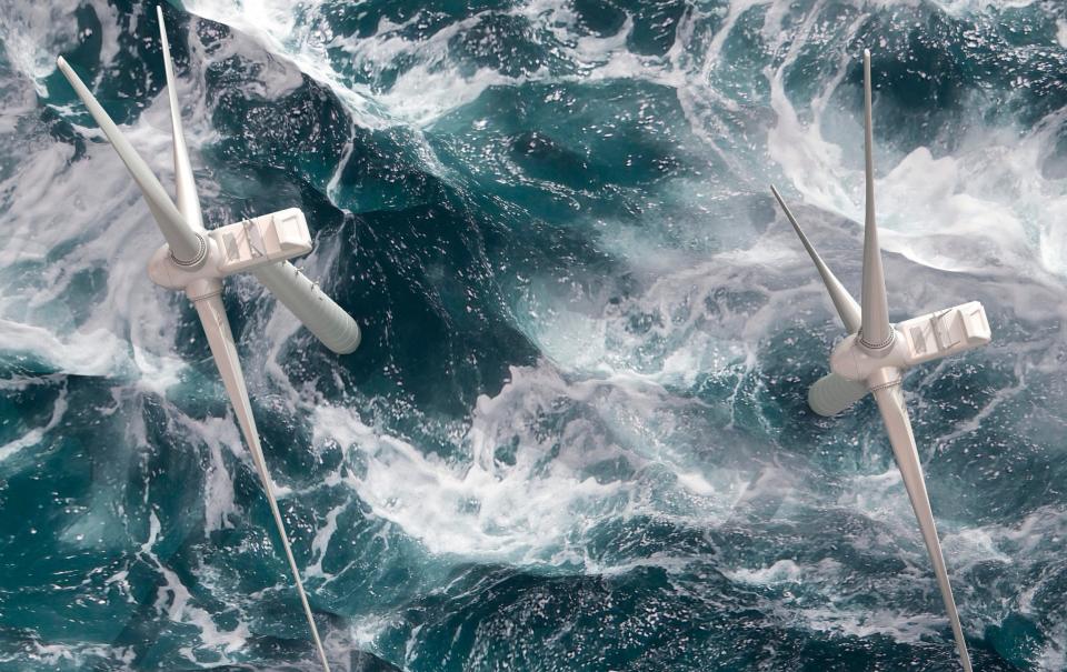 Aerial view of two wind turbines on the ocean - timandtim /Digital Vision 