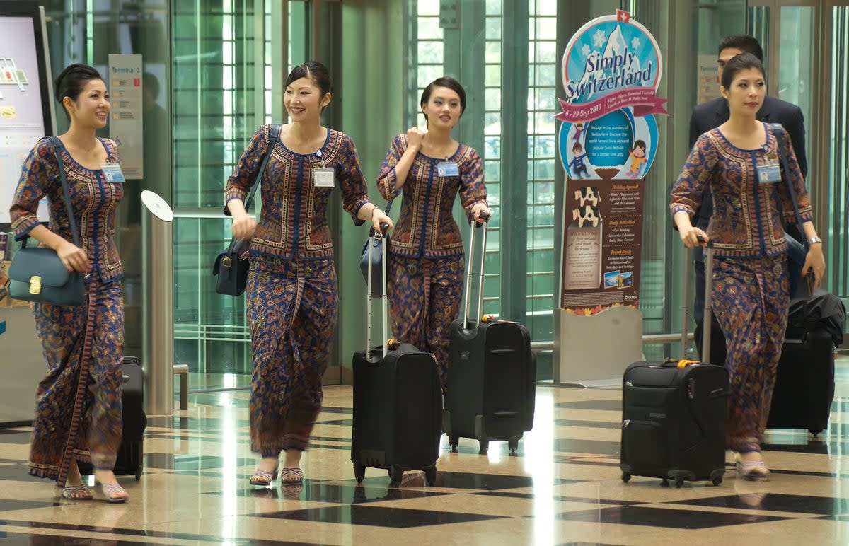 Sarong kebaya-inspired uniforms dress Singapore Airlines cabin crew (Getty Images)