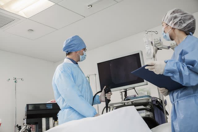 XiXinXing/Getty Images Two surgeons preparing for surgery