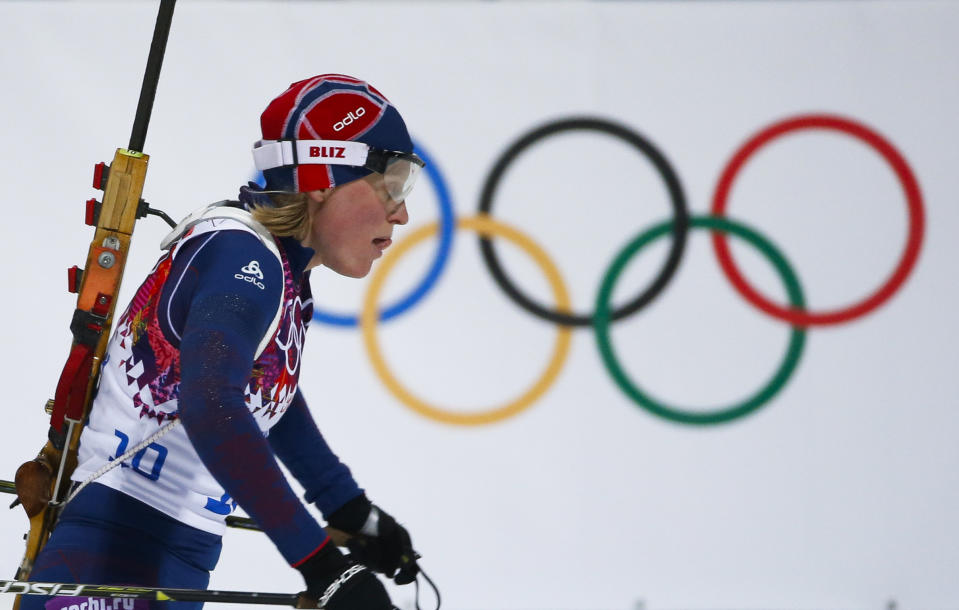 Norway's Tora Berger skis on her way to win the silver medal in the women's biathlon 10k pursuit, at the 2014 Winter Olympics, Tuesday, Feb. 11, 2014, in Krasnaya Polyana, Russia. (AP Photo/Felipe Dana)