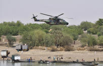 <p>French President Emmanuel Macron flies over Gao in a military helicopter as he visits the troops of Operation Barkhane, France’s largest overseas military operation, in Gao, northern Mali, Friday, May 19, 2017. (Christophe Petit Tesson, Pool via AP) </p>