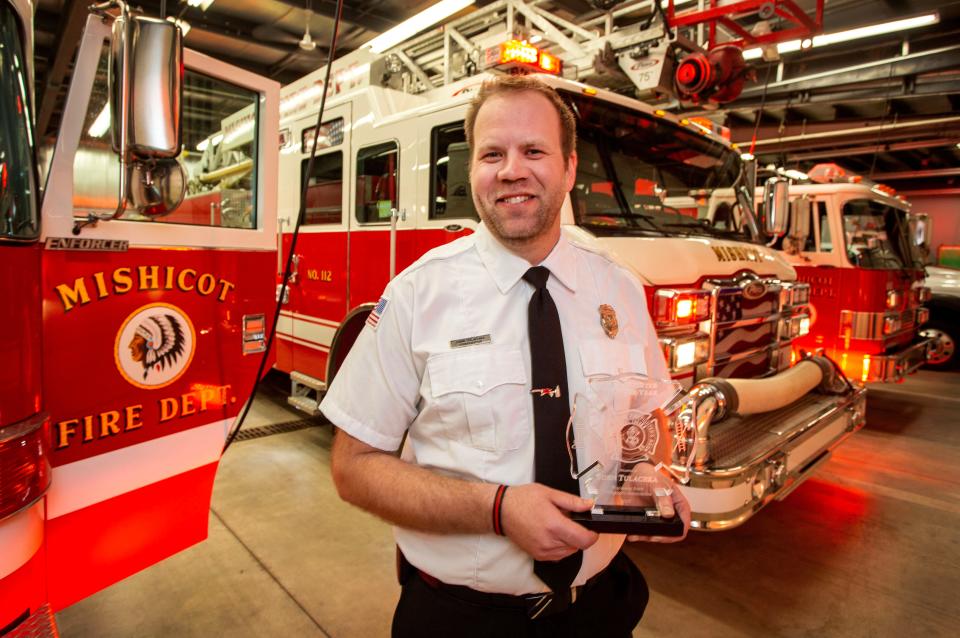 John Tulachka, of the Mishicot Fire Department, seen here, Wednesday March 29, 2023 at the Mishicot Fire Station, was named the 2022 Firefighter of the year by the Wisconsin State Firefighter's Association.