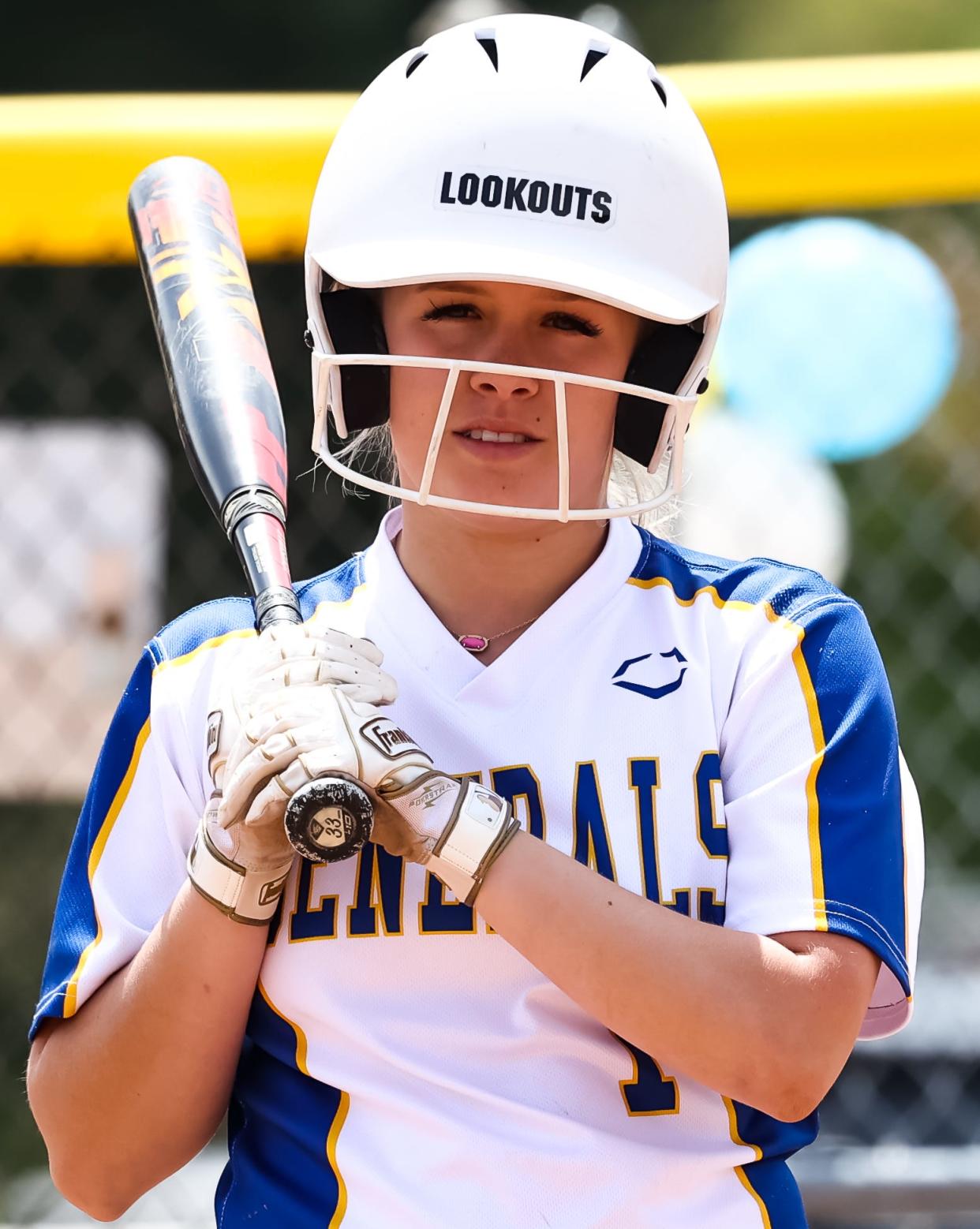 Wooster's Tori Pettorini looks towards the third base for the sign during this at bat against Ashland.