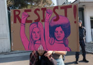 <p>Demonstrators gather to protest against US President Donald Trump in front of the US Embassy on January 21, 2017 in Lisbon, Portugal. Simultaneous protests have been staged, mainly by women, in many different countries against Trump’s behavior to women. (Horacio Villalobos – Corbis/Corbis via Getty Images) </p>