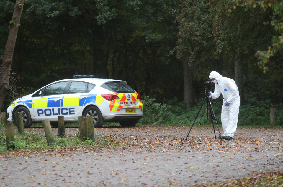 Forensic investigators at Watlington Hill in Oxfordshire after the body of a woman was discovered at the National Trust estate, a man has been arrested on suspicion of murder and is being treated for serious injuries, police said.