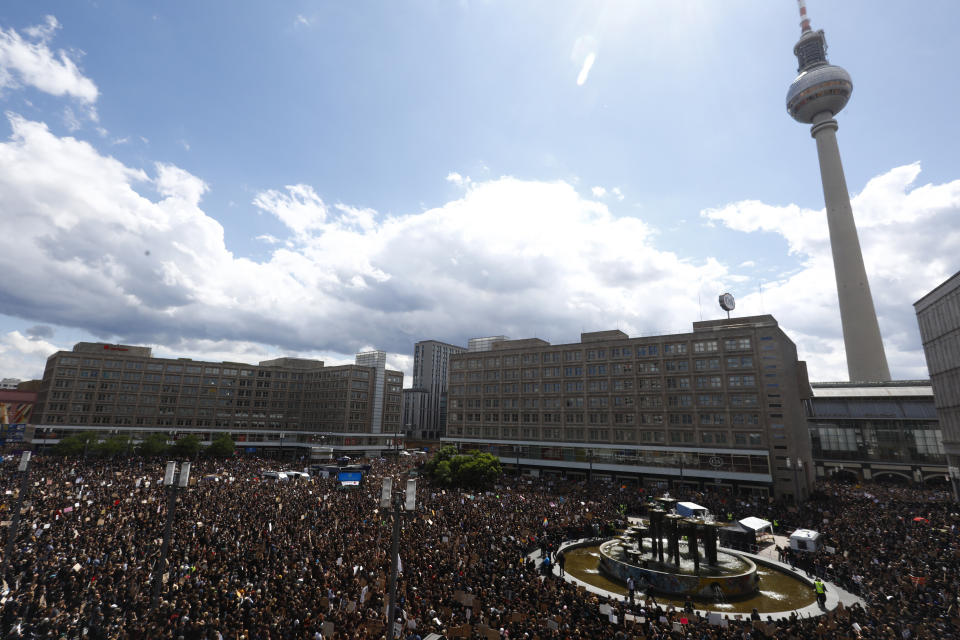 Alexanderplatz in Berlin, Germany, is seen fully crowded with people holding banners and placards as they stand in silence for eight minutes and 46 seconds in tribute to George Floyd during a protest against racism and police brutality on June 6, 2020. (Photo: Michele Tantussi via Getty Images)