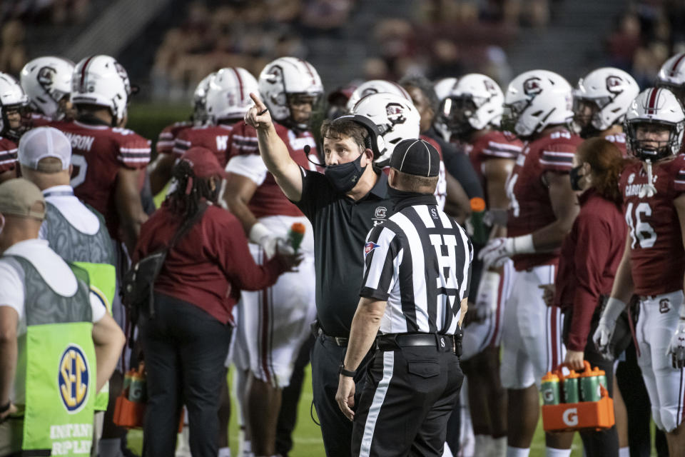 South Carolina coach Will Muschamp points to the video screen during the first half of the team's NCAA college football game against Texas A&M on Saturday, Nov. 7, 2020, in Columbia, S.C. (AP Photo/Sean Rayford)