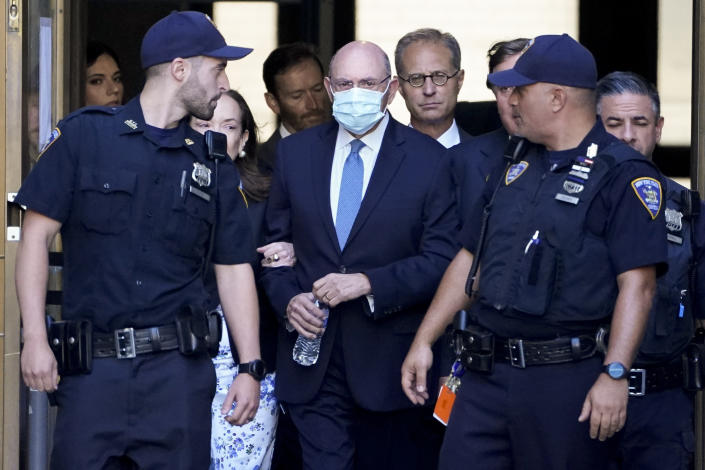 Trump Organization's former Chief Financial Officer Allen Weisselberg, center, leaves court, Thursday, Aug. 18, 2022, in New York. Weisselberg pled guilty on Thursday to tax violations in a deal that would require him to testify about business practices at the former president's company. (AP Photo/John Minchillo)