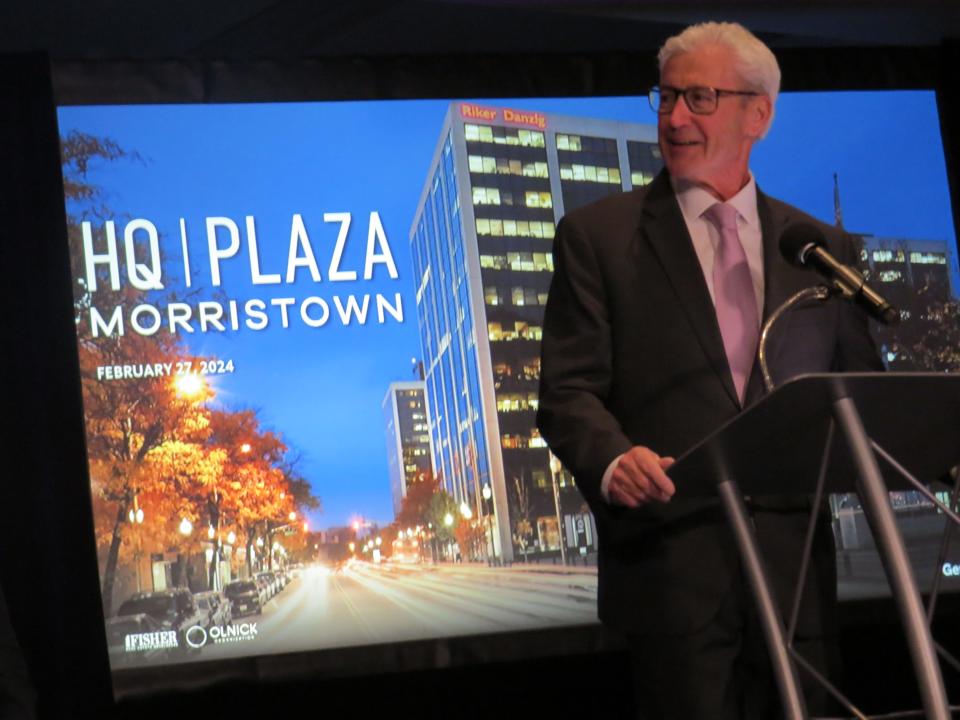 Morristown Mayor Tim Dougherty speaks at Headquarters Plaza, renamed HQ Plaza, on Tuesday. The downtown complex announced a $7 million renovation that will add open space, conference rooms and amenities throughout the concourse between its three office towers and the Hyatt Regency hotel.
