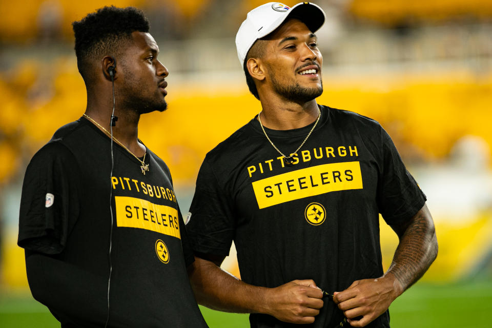 PITTSBURGH, PA - AUGUST 09: Pittsburgh Steelers wide receiver JuJu Smith-Schuster (19) and Pittsburgh Steelers running back James Conner (30) look on during the NFL football game between the Tampa Bay Buccaneers and the Pittsburgh Steelers on August 09, 2019 at Heinz Field in Pittsburgh, PA. (Photo by Mark Alberti/Icon Sportswire via Getty Images)