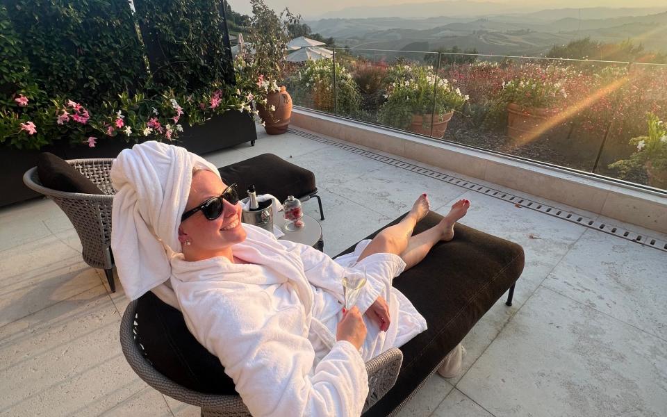 Maddi soaking up views of the Tuscan hills from the five-star Villa San Michele
