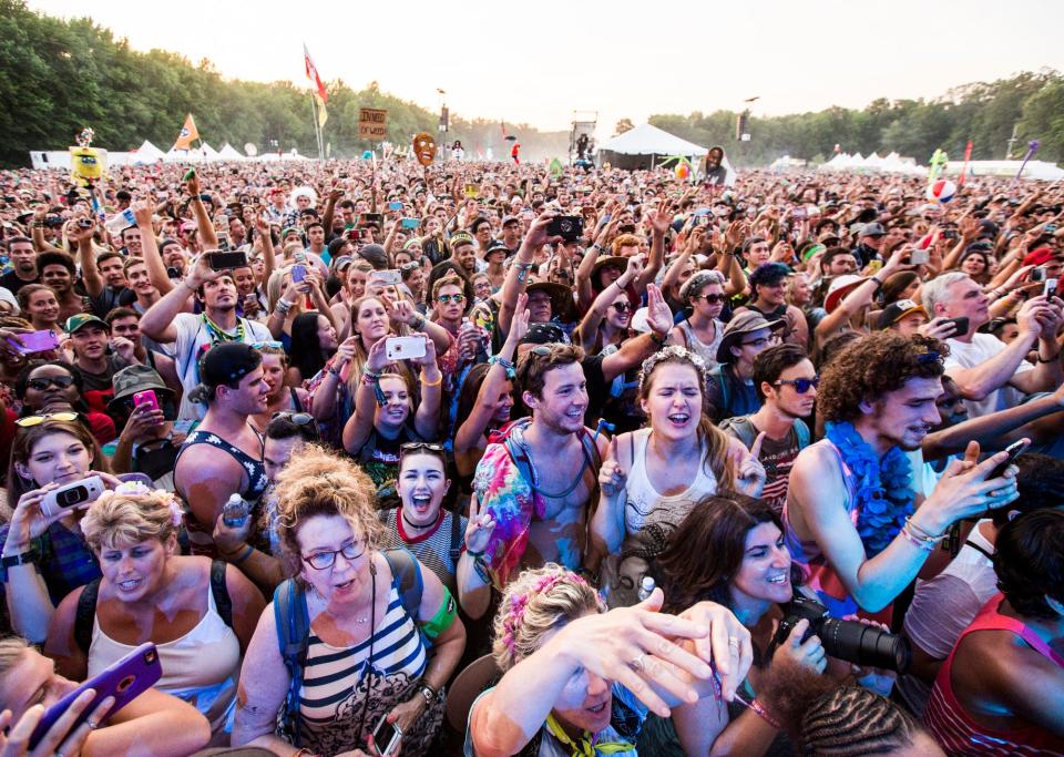 Fans cheer as Earth, Wind, and Fire perform on the Backyard Stage at the Firefly Music Festival in 2016.