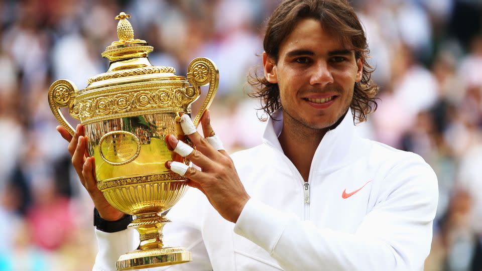 Nadal celebrates winning Wimbledon in 2010. - Julian Finney/Getty Images