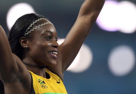 2016 Rio Olympics - Athletics - Final - Women's 200m Final - Olympic Stadium - Rio de Janeiro, Brazil - 17/08/2016. Elaine Thompson (JAM) of Jamaica reacts after winning the gold. REUTERS/Alessandro Bianchi