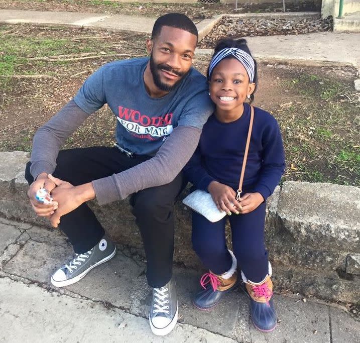 Randall Woodfin, left, campaigns in Birmingham's Southtown neighborhood. He faces a runoff for mayor. (Photo: Randall Woodfin)