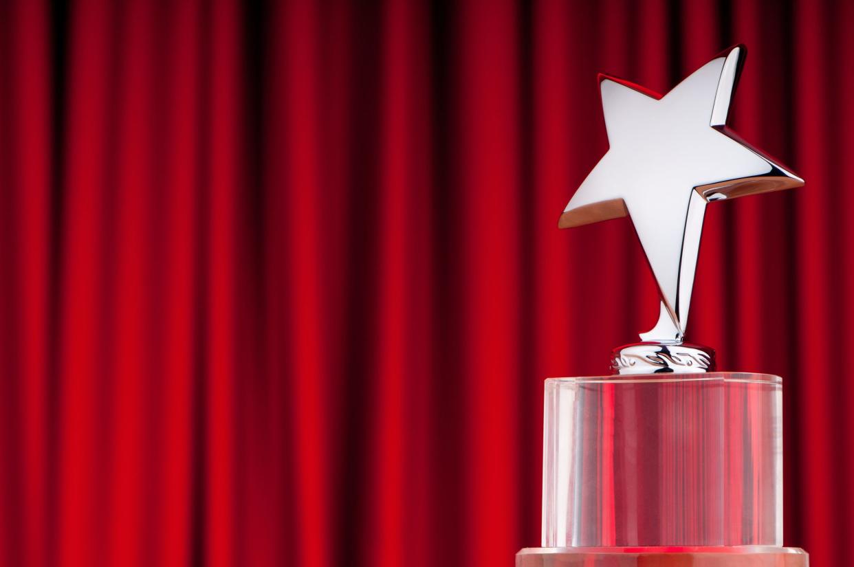 Star award against curtain background