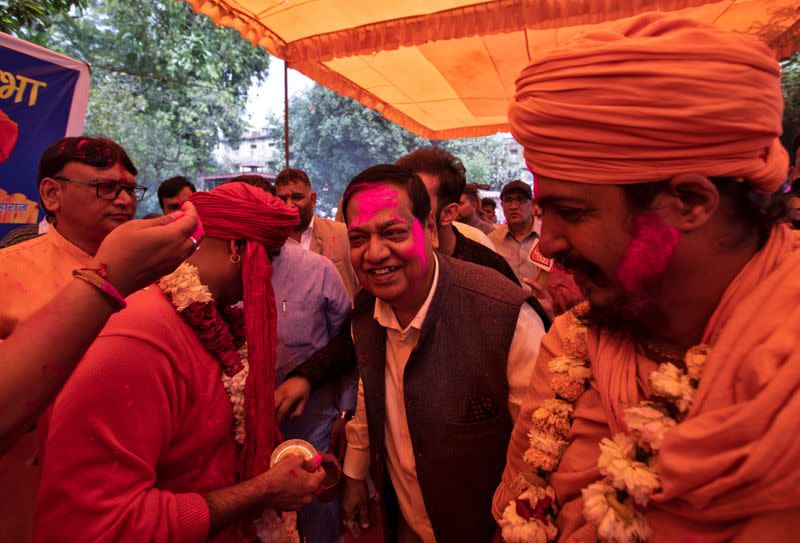 Members of All India Hindu Mahasabha attend a gaumutra (cow urine) party, which according to them helps in warding off coronavirus disease (COVID-19), in New Delhi