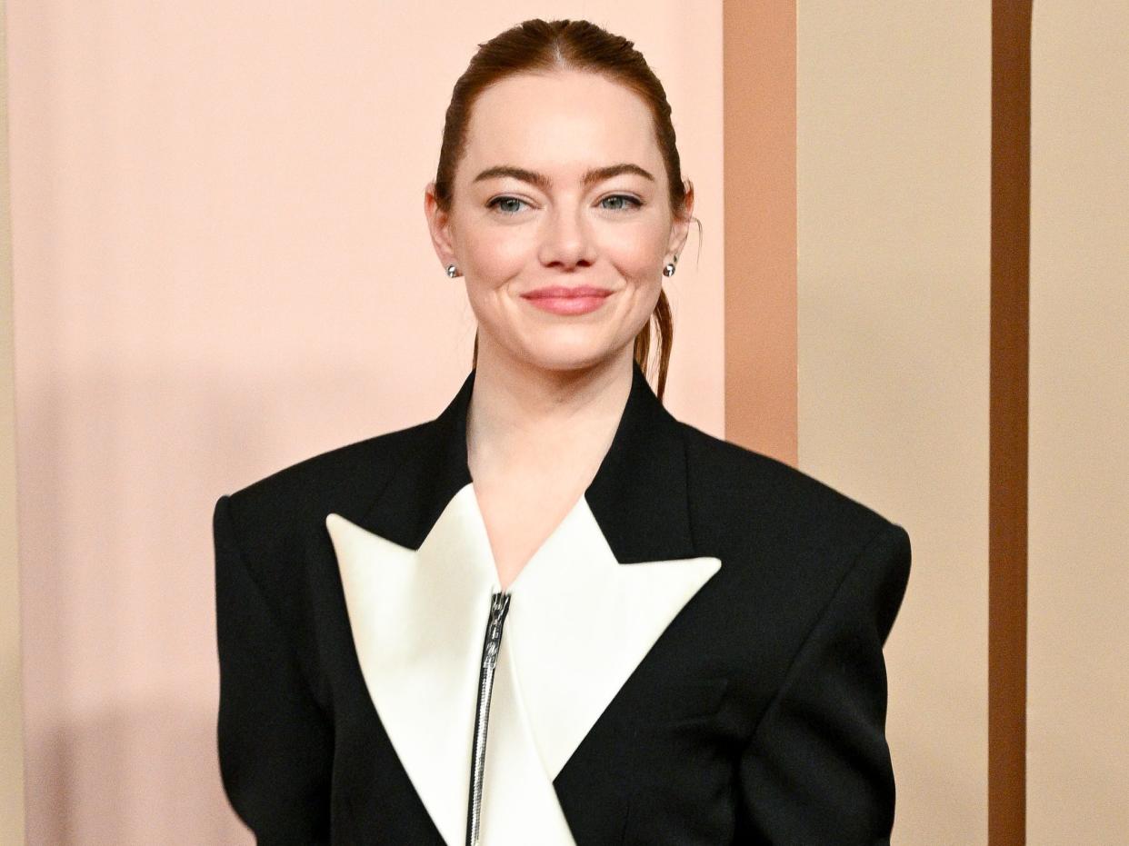 Emma Stone in a black and white jacket