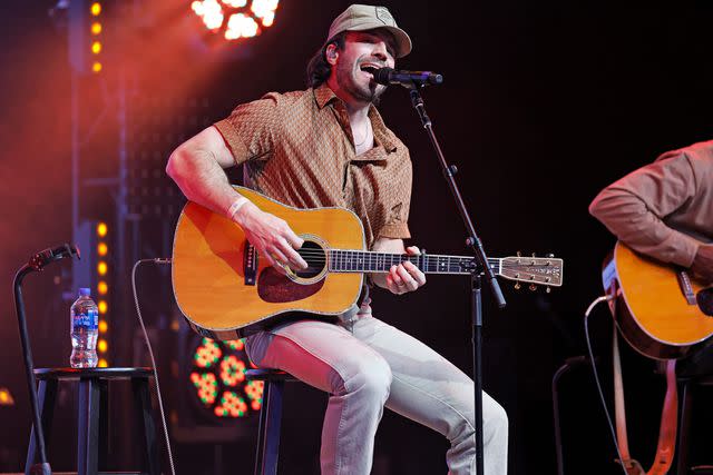 Jason Kempin/Getty Sam Hunt performing during Musicians On Call at Wildhorse Saloon in January 2023 in Nashville
