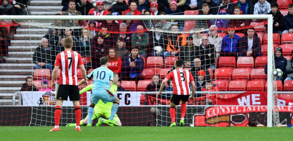 <p>Sunderland’s Jordan Pickford and Burnley’s Ashley Barnes look on as the ball goes wide </p>