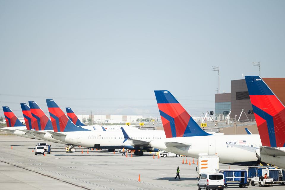 Delta Air Lines planes wait on the tarmac at the Salt Lake City International Airport in Salt Lake City on Friday, May 19, 2023. | Ryan Sun, Deseret News