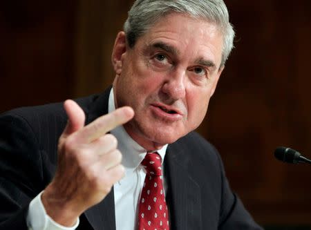 FILE PHOTO: Robert Mueller, as FBI director, testifies before the U.S. Senate Judiciary Committee on Capitol Hill in Washington. Sept. 16, 2009. REUTERS/Yuri Gripas/Files