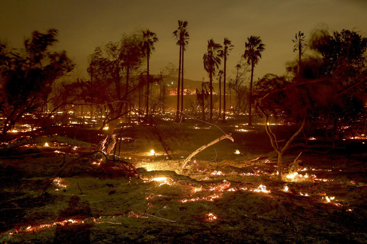 Smoldering Peters Canyon Regional Park in Orange, Calif. (Photo: Irfan Khan / Los Angeles Times via Getty Images)