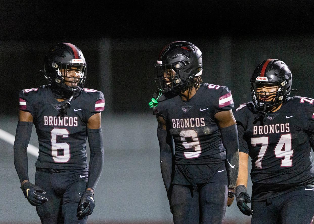 Palm Beach Central wide receiver Kamare Williams, (6) celebrates his touchdown catch with Baron Ryba, (9) and 
Adam Kowalik, (74) against Benjamin during their game in Wellington, Florida on October 6, 2023.