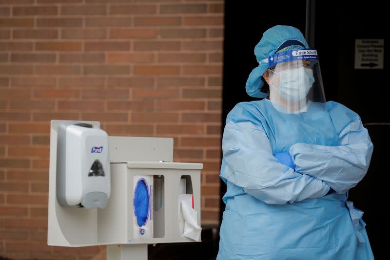 FILE PHOTO: A nurse works at a drive-thru testing site for the coronavirus disease (COVID-19) at North Shore University Hospital in Manhasset, New York