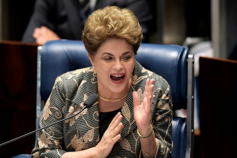 Suspended Brazilian President Dilma Rousseff answers to questions during the impeachment trial, at the National Congress in Brasilia, on August 29, 2016