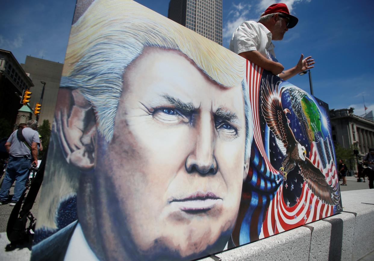 A supporter of Donald Trump displays his artwork in Cleveland, July 17, 2016. (Photo: Jim Urquhart/Reuters)