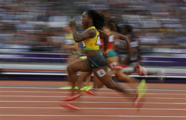 Jamaica's Veronica Campbell-Brown takes the lead in her women's 100m round 1 event at the London 2012 Olympic Games in the Olympic Stadium August 3, 2012.