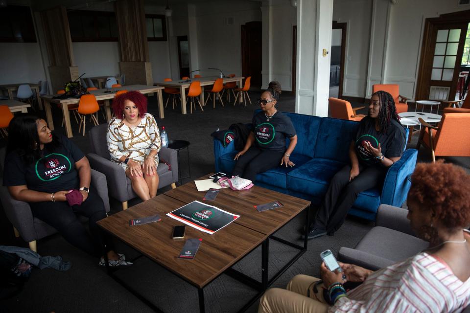 Joy Briscoe, Nikole Hannah-Jones, Sharina Sallis, Sheritta Stokes and Lori Dale, the leadership team of the 1619 Freedom School, talk about what the school will look like, on Tuesday, Aug. 31, 2021, in Waterloo. 