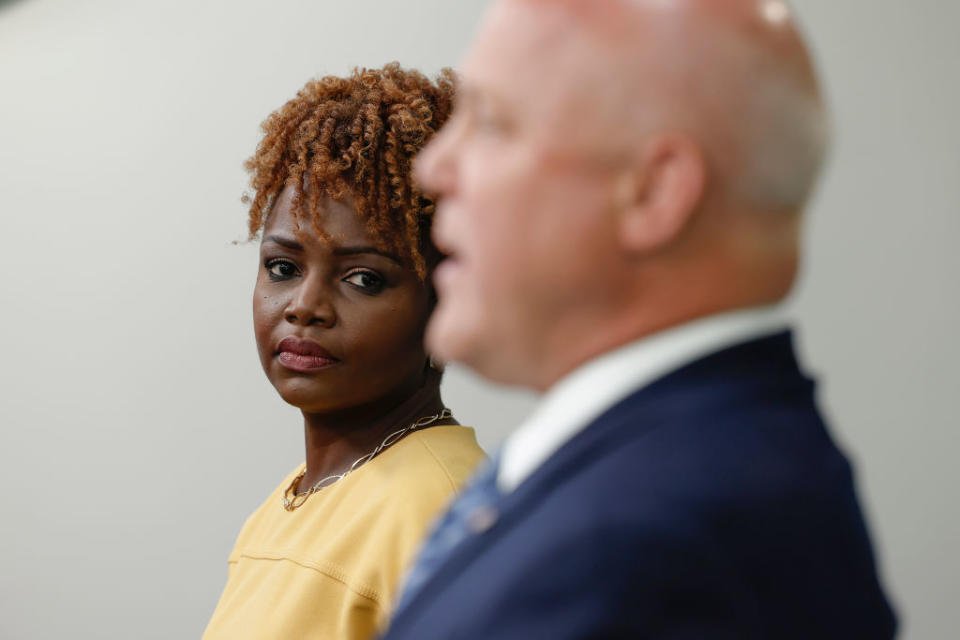 White House press secretary Karine Jean-Pierre listens to a speaker during the daily news briefing on Friday. 