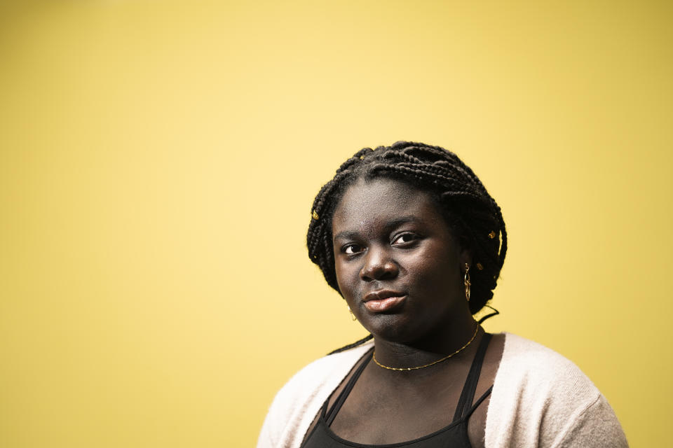 Ebele Azikiwe, 12, poses for a photograph in Cherry Hill, N.J., Wednesday, March 24, 2021. Azikiwe testified in October at state Assembly hearing, lending her support to legislation requiring New Jersey's school districts to add diversity to curriculums. Democratic Gov. Phil Murphy signed the bill into law. (AP Photo/Matt Rourke)