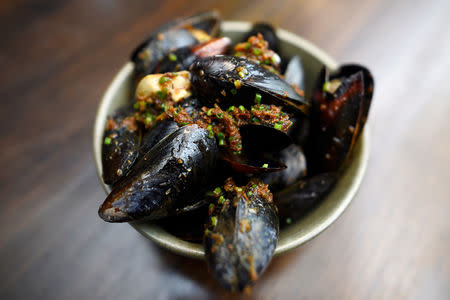 A dish of mussels is seen at Chef Christopher Haatuft's restaurant Lysverket in Bergen, Norway, July 31, 2018. REUTERS/Clodagh Kilcoyne