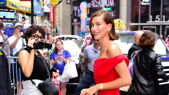 Hailey Bieber Is a Bombshell in a Red Dress for Her Strawberry Glazed Donut  Lip Treatment Launch