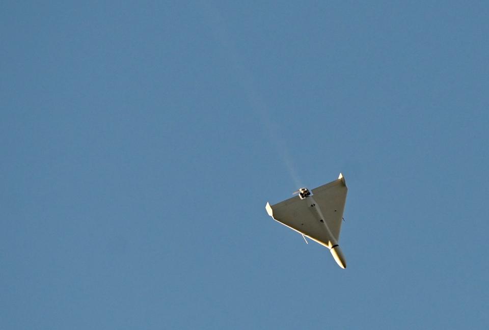 File photo: A drone flies over Kyiv during an attack on 17 October, 2022 (AFP via Getty Images)