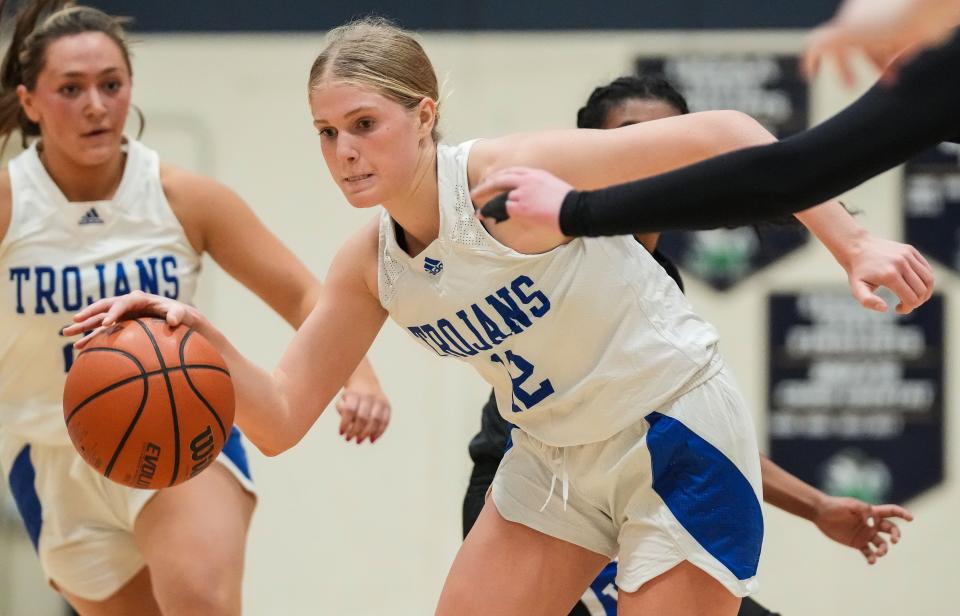 Bishop Chatard Trojans Olivia Berzai (12) rushes up the court Thursday, Jan. 11, 2024, during the City Tournament semifinals at Cathedral High School in Indianapolis. The Bishop Chatard Trojans defeated Heritage Christian, 56-45.