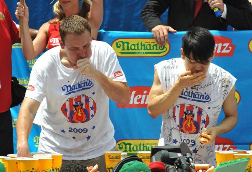 Kobayashi is seen squaring off against Joey Chestnut at the Nathan’s Hot Dog Eating Contest in 2009. Paul Martinka