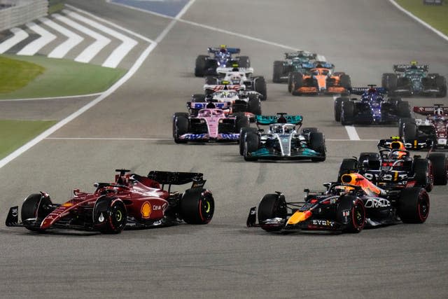 Ferrari driver Charles Leclerc, left, and Red Bull's Max Verstappen do battle on the track